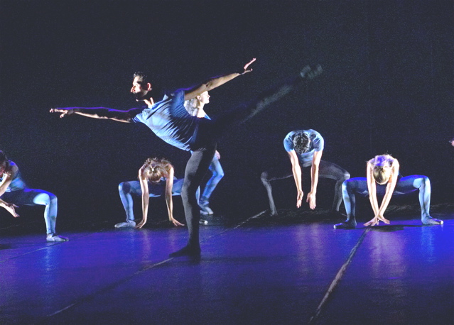 Male and female dancers on stage 